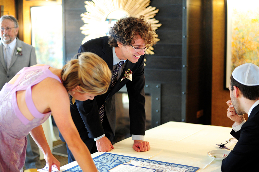 signing the ketubah before a cambridge wedding